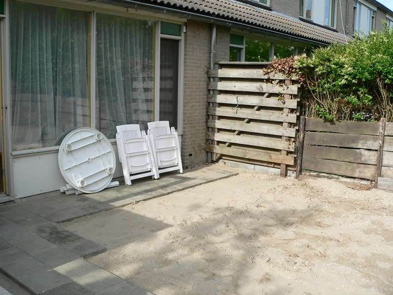 Zwaaiende buurmannen